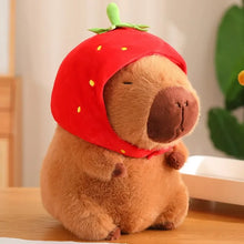 Load image into Gallery viewer, cute capybara plushie in strawberry hat perfect for table decoration