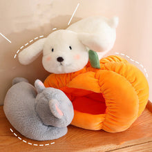 Load image into Gallery viewer, Plush toys, including a rabbit and a mouse, with a pumpkin-shaped cushion on a wooden surface.