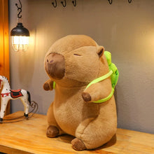 Load image into Gallery viewer, Meet the Capybara Backpack Buddies—the perfect plush companions for anyone who needs a dose of cute and cozy in their life! 