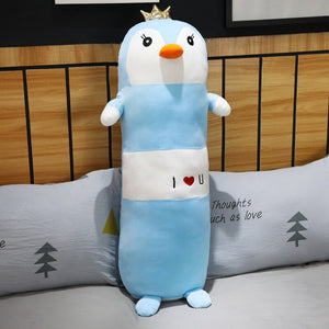 Cute Blue penguin plushie with a crown on its head. 