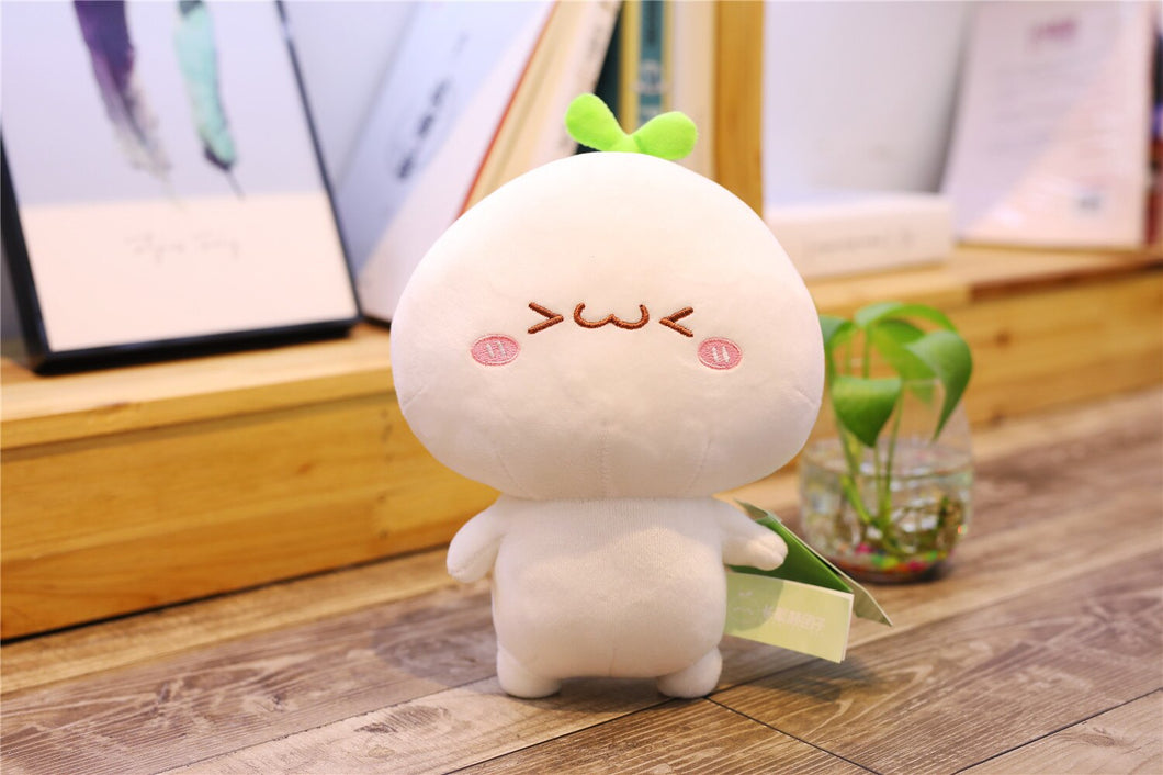 cute plushie with laughing face and small eyes