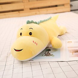 yellow smiling dinosaur plushie