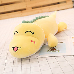 yellow dinosaur plushie with tongue out