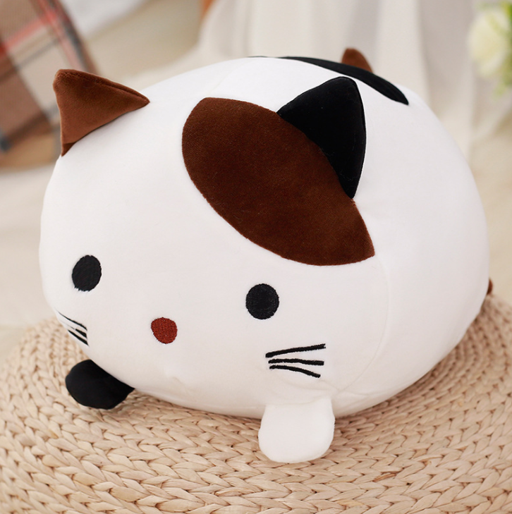 cute hello kitty like plushie in white and brown