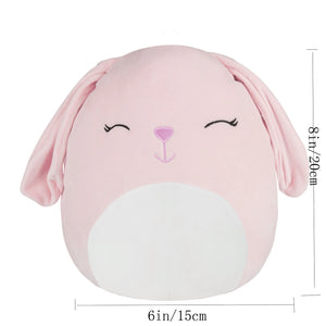 cute pink bunny plush toy with smiley face