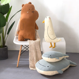 stuffed bear plushie, stuffed seabird plushie, stuffed whale plushie