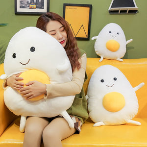 girl hugging big egg plushie