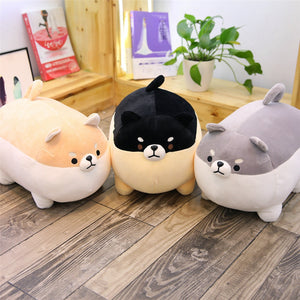 light brown, black, and grey angry shiba inu plushies side by side
