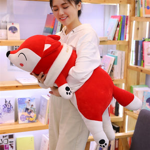 girl hugging red fox plushie