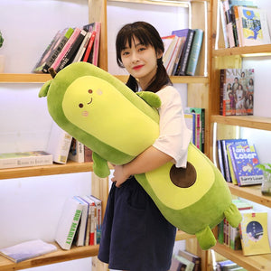 girl holding avocado long pillow plushie