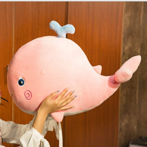 cute smiling smiley pink blue whale with tiny water sprout stuffed animal plush toy
