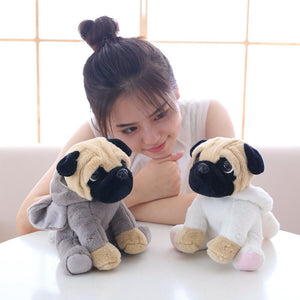 cute pug dog in elephant plushie and cute pug dog in rabbit plushie