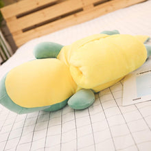 Load image into Gallery viewer, stomach of green dinosaur plushie showing blanket