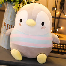 Load image into Gallery viewer, Get this cute penguin plushie for your family or partner as it symbolizes togetherness and community.