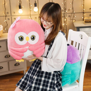 This pink owl plushie comes with blanket to keep you warm at night.