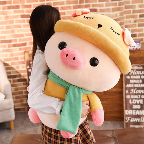 girl hugging big cute pig plushie