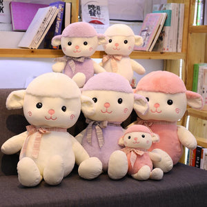 A family of smart intelligent cute sheep plushie. White, pink, purple.