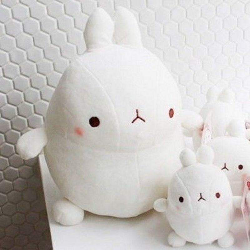 cute Molang rabbit plushie in white and its original round shape