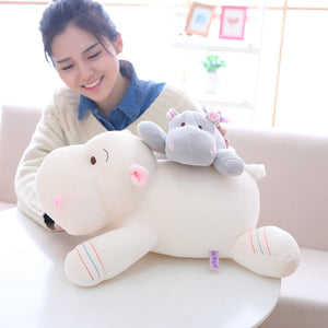 adorable baby little hippo plush toy lying on mummy hippo plushie back