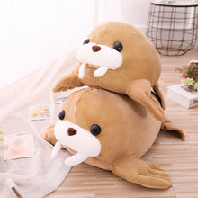 Load image into Gallery viewer, Look how soft and squishy these walrus plushies are!
