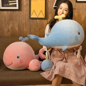 cute smiling smiley pink blue whale with tiny water sprout stuffed animal plush toy