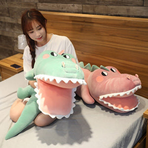girl playing with alligator/crocodile plushies