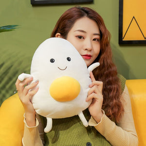 girl holding small cute egg plushie