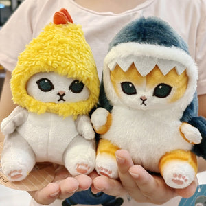 Cute ginger cat plushie in shark costume - trendy and huggable!