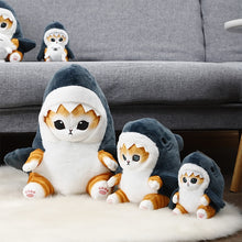 Load image into Gallery viewer, Family of Ginger Cat Plushies in Shark Outfits sitting on soft carpet